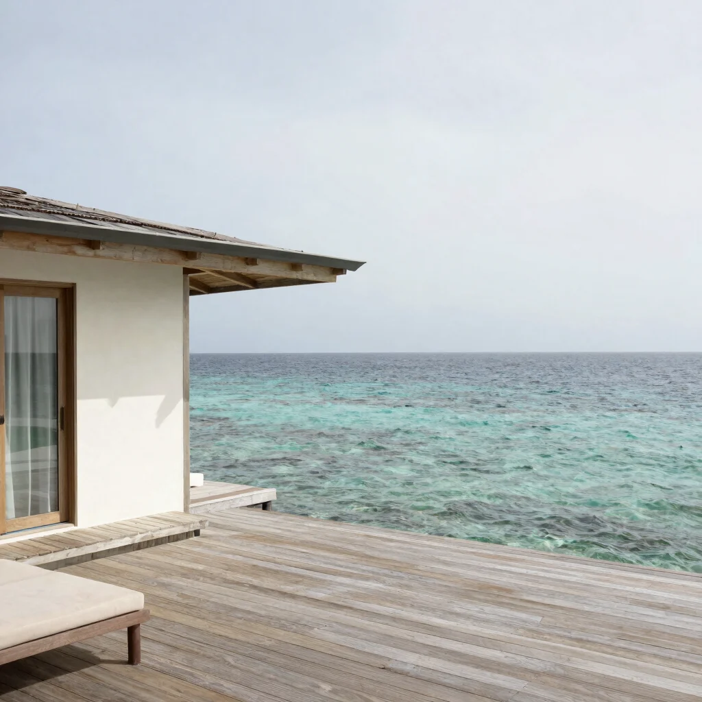 Secluded coastal residence with a timber deck over turquoise water, wide environmental view, luminous neutrals.